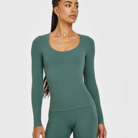 SoftMotion™ Scoop Neck Long Sleeve Top with Built in Bra Shelf with White Logo | Iced Green
