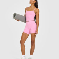 SoftMotion™ Strappy Mid Vest with Built in Bra Shelf with White Logo | Rose Pink