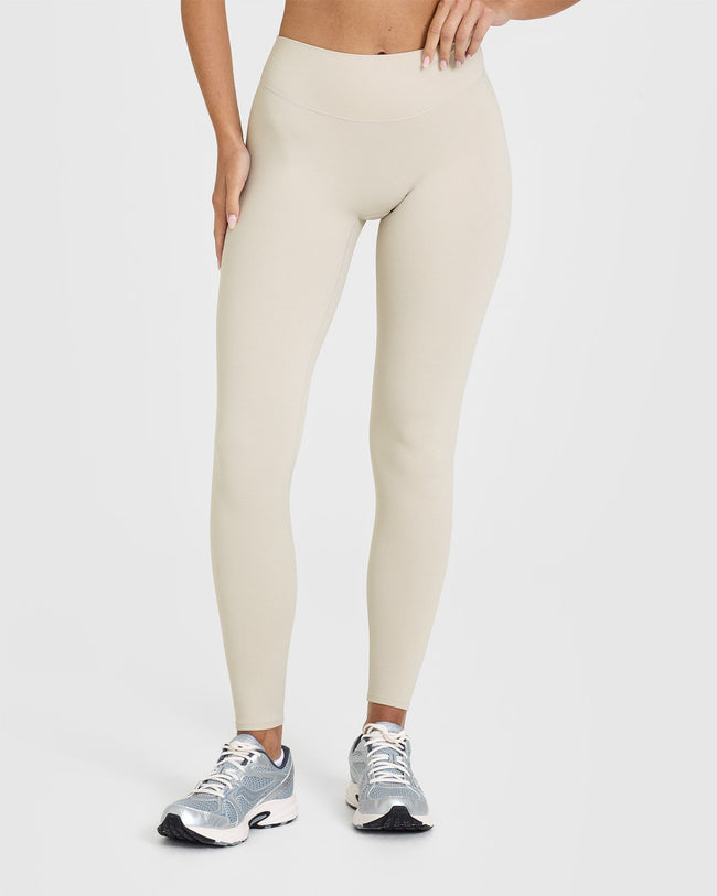 SoftMotion™ Leggings with White Logo | Sand