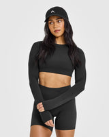 SoftMotion™ Long Sleeve Crop Top with White Logo | Soft Black
