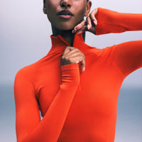 Oner Seamless Mid Weight Fitted 1/2 Zip Long Sleeve Top | Energy Orange