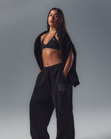 EnhanceLift™ Seamless Minimal Halter Neck Bralette with White Logo | Black