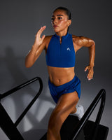 EasyLift™ Zip High Neck Sports Bra with White Logo | Vintage Navy