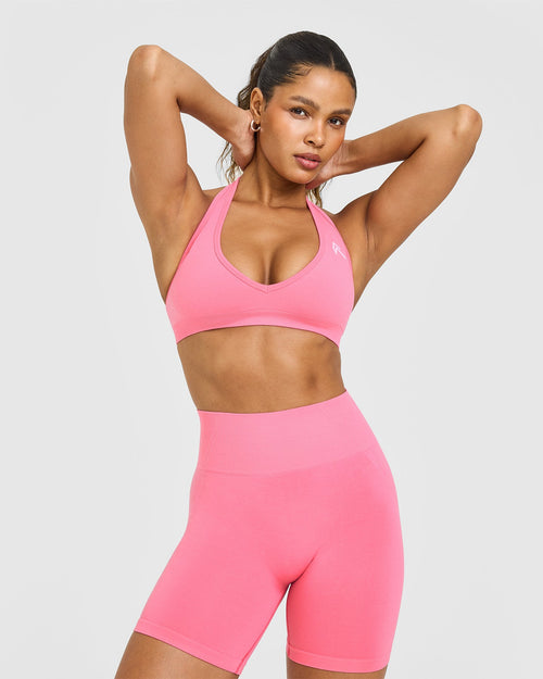 Effortless Seamless Halter Neck Sports Bra with White Logo | Peony Pink