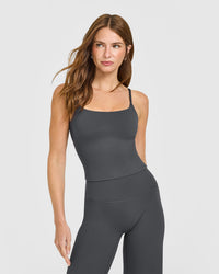 SoftMotion™ Strappy Mid Vest with Built in Bra Shelf with White Logo | Coal