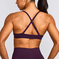 EnhanceLift™ Seamless Strappy Sports Bra with Grey Logo | Blackberry Purple