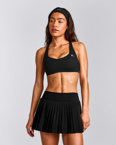 EasyLift™ Cross Back Sports Bra with Grey Logo | Black