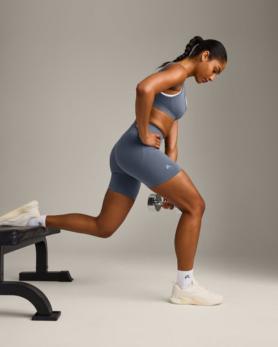 EffortlessLift™ Seamless Mid Rise Shorts with Grey Logo | Light Granite Blue