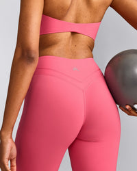 UnifiedMove™ Wrap Flared Bottoms with Reflective Logo | Hot Girl Pink