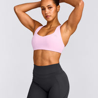 EasyLift™ Cross Back Sports Bra with Grey Logo | Chalk Pink