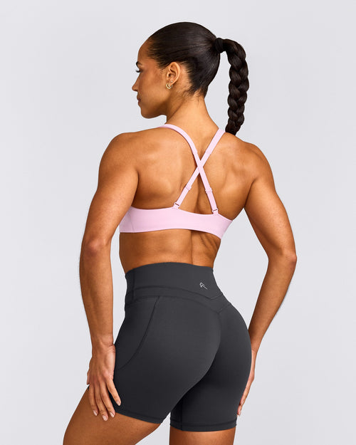 EasyLift™ Cross Back Sports Bra with Grey Logo | Chalk Pink
