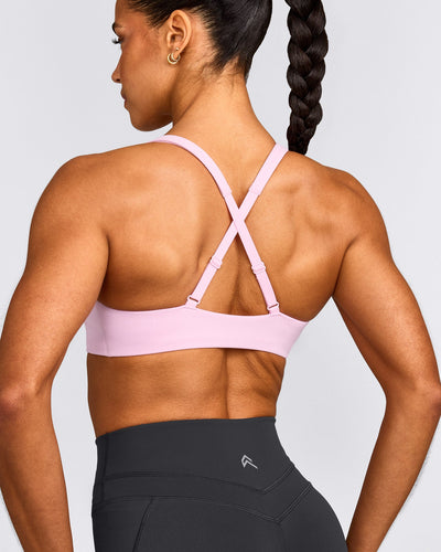 EasyLift™ Cross Back Sports Bra with Grey Logo | Chalk Pink