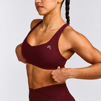 EasyLift™ Cross Back Sports Bra with Grey Logo | Rosewood