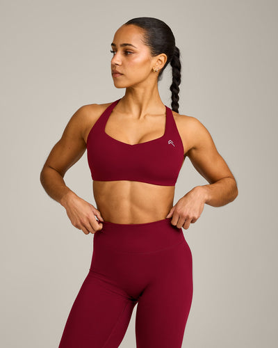 EasyLift™ Cross Back Sports Bra with Grey Logo | Ruby Red