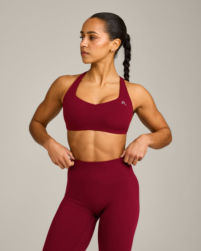 EasyLift™ Cross Back Sports Bra with Grey Logo | Ruby Red