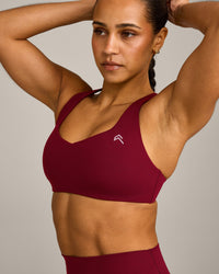 EasyLift™ Cross Back Sports Bra with Grey Logo | Ruby Red