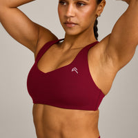EasyLift™ Cross Back Sports Bra with Grey Logo | Ruby Red