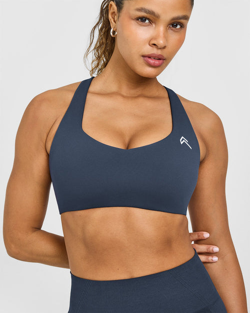 EasyLift™ Cross Back Sports Bra with White Logo | True Blue