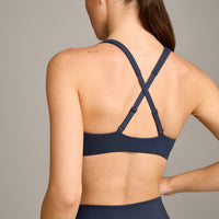 EasyLift™ Cross Back Sports Bra with Grey Logo | True Blue