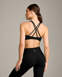 EasyLift™ High Neck Sports Bra with Grey Logo | Black