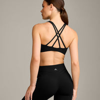 EasyLift™ High Neck Sports Bra with Grey Logo | Black