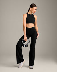 EasyLift™ High Neck Sports Bra with Grey Logo | Black