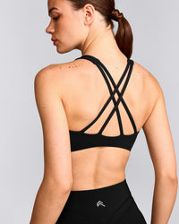 EasyLift™ High Neck Sports Bra with Grey Logo | Black