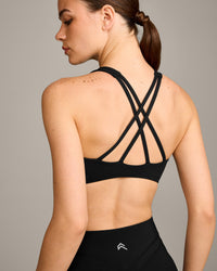 EasyLift™ High Neck Sports Bra with Grey Logo | Black