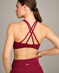 EasyLift™ High Neck Sports Bra with Grey Logo | Ruby Red