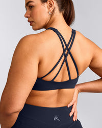 EasyLift™ High Neck Sports Bra with Grey Logo | True Blue
