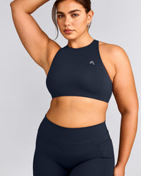 EasyLift™ High Neck Sports Bra with Grey Logo | True Blue