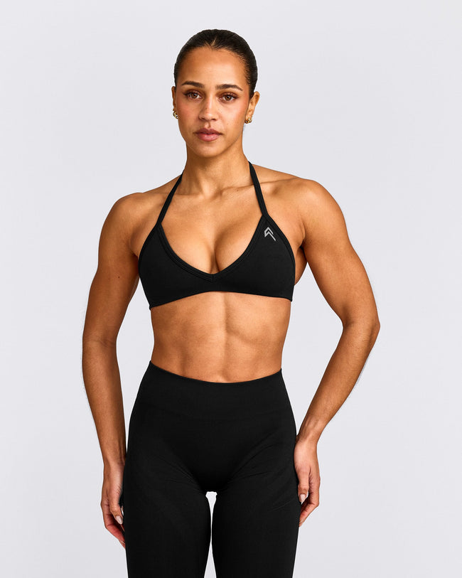 EnhanceLift™ Seamless Minimal Halter Neck Bralette with Grey Logo | Black