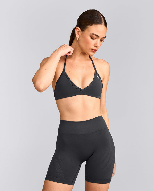 EnhanceLift™ Seamless Minimal Halter Neck Bralette with Grey Logo | Coal