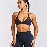EnhanceLift™ Seamless Minimal Halter Neck Bralette with Grey Logo | True Blue