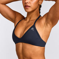 EnhanceLift™ Seamless Minimal Halter Neck Bralette with Grey Logo | True Blue