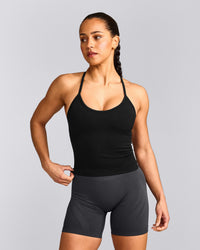 EnhanceLift™ Seamless Strappy Racer Tank Top with Built in Bra Shelf with Grey Logo | Black