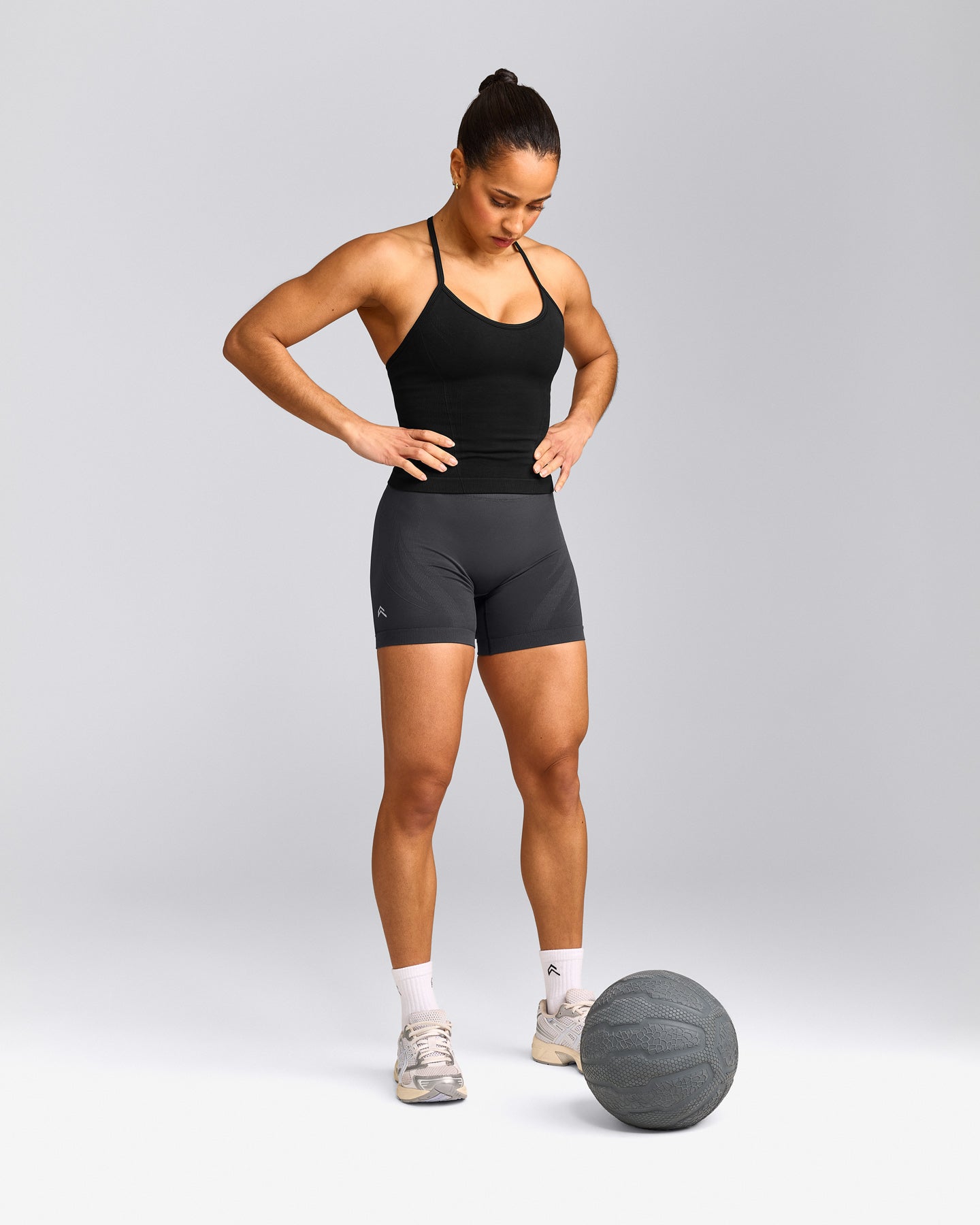 EnhanceLift™ Seamless Strappy Racer Tank Top with Built in Bra Shelf with Grey Logo | Black