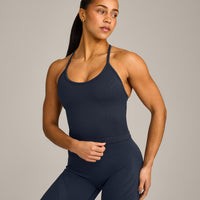 EnhanceLift™ Seamless Strappy Racer Vest with Built in Bra Shelf with Grey Logo | True Blue
