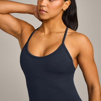 EnhanceLift™ Seamless Strappy Racer Vest with Built in Bra Shelf with Grey Logo | True Blue