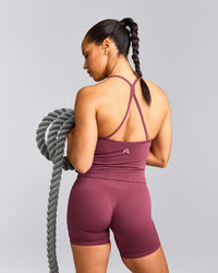 EnhanceLift™ Seamless Strappy Racer Tank Top with Built in Bra Shelf with Grey Logo | Burnt Maroon Red