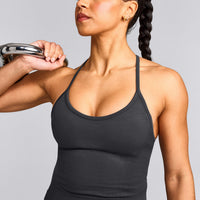 EnhanceLift™ Seamless Strappy Racer Tank Top with Built in Bra Shelf with Grey Logo | Coal