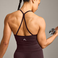 EnhanceLift™ Seamless Strappy Racer Vest with Built in Bra Shelf with Grey Logo | Plum Brown