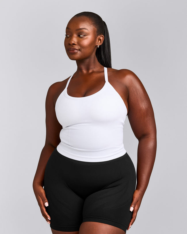 EnhanceLift™ Seamless Strappy Racer Tank Top with Built in Bra Shelf with Grey Logo | White