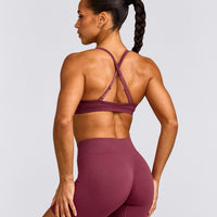 EnhanceLift™ Seamless Strappy Sports Bra with Grey Logo | Burnt Maroon Red