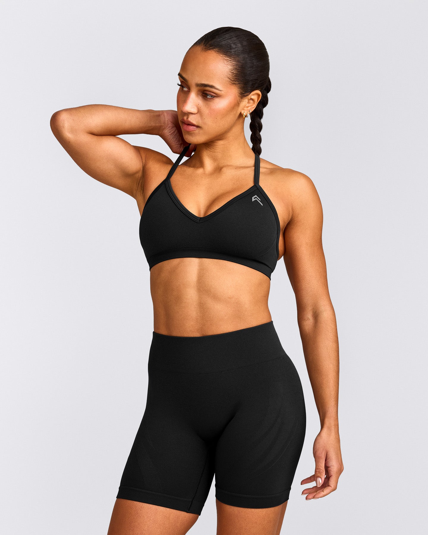 EnhanceLift™ Seamless Strappy Sports Bra with Grey Logo | Black