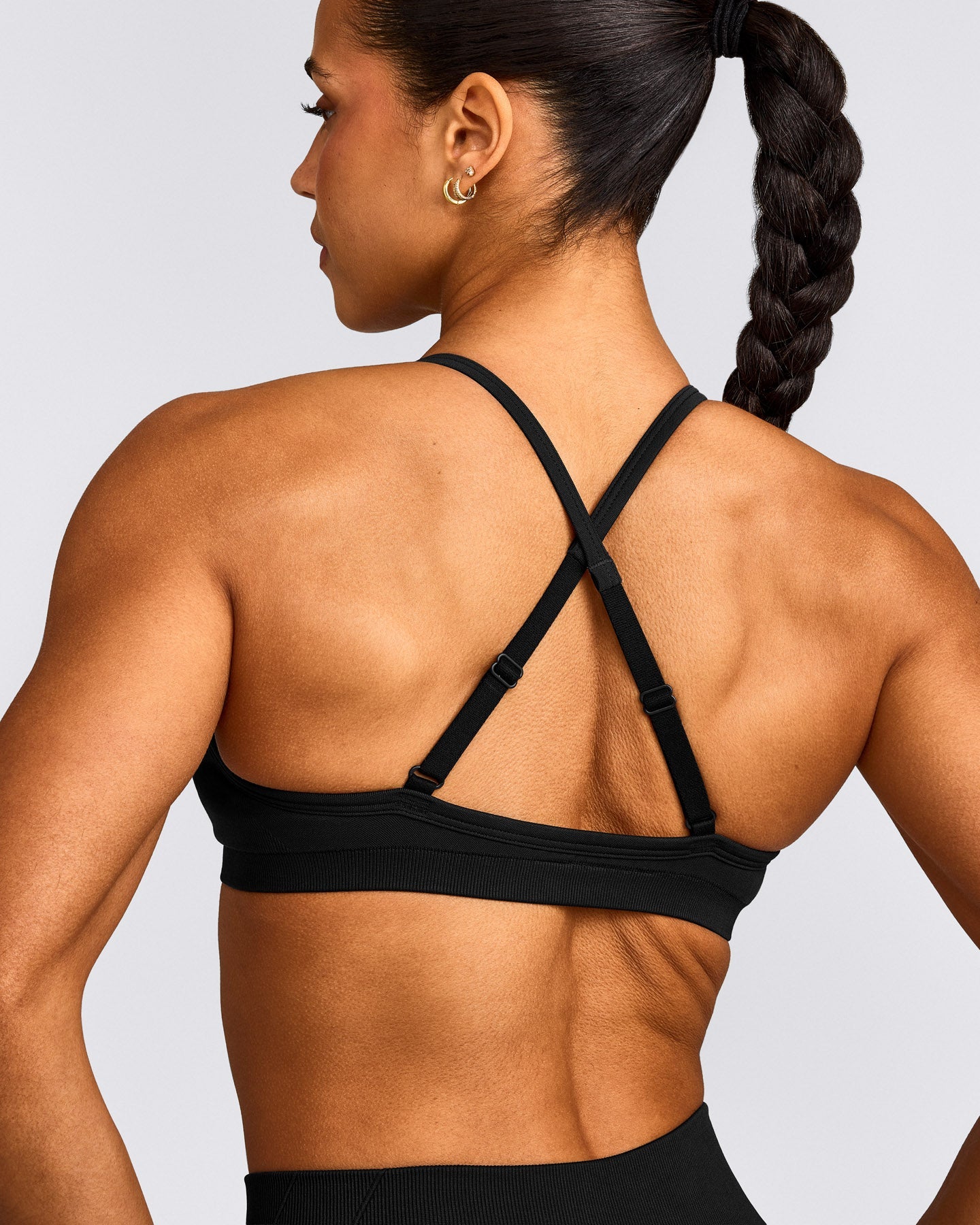 EnhanceLift™ Seamless Strappy Sports Bra with Grey Logo | Black