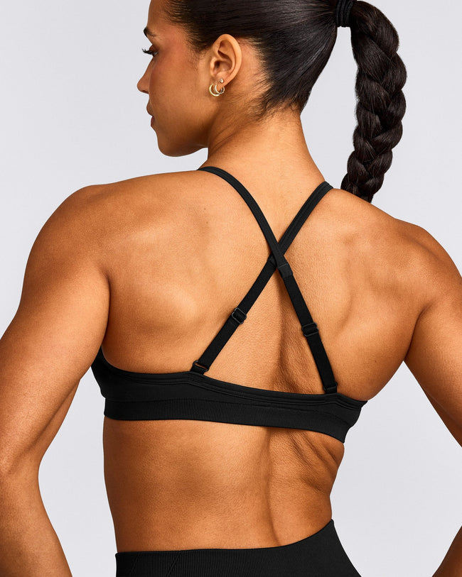 EnhanceLift™ Seamless Strappy Sports Bra with Grey Logo | Black