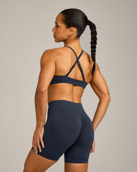 EnhanceLift™ Seamless Strappy Sports Bra with Grey Logo | True Blue