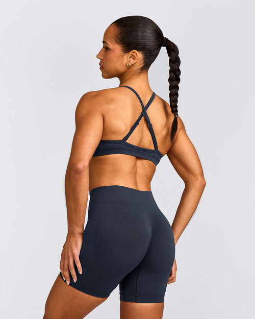 EnhanceLift™ Seamless Strappy Sports Bra with Grey Logo | True Blue