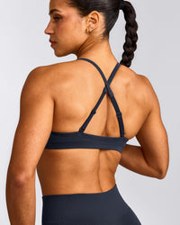 EnhanceLift™ Seamless Strappy Sports Bra with Grey Logo | True Blue